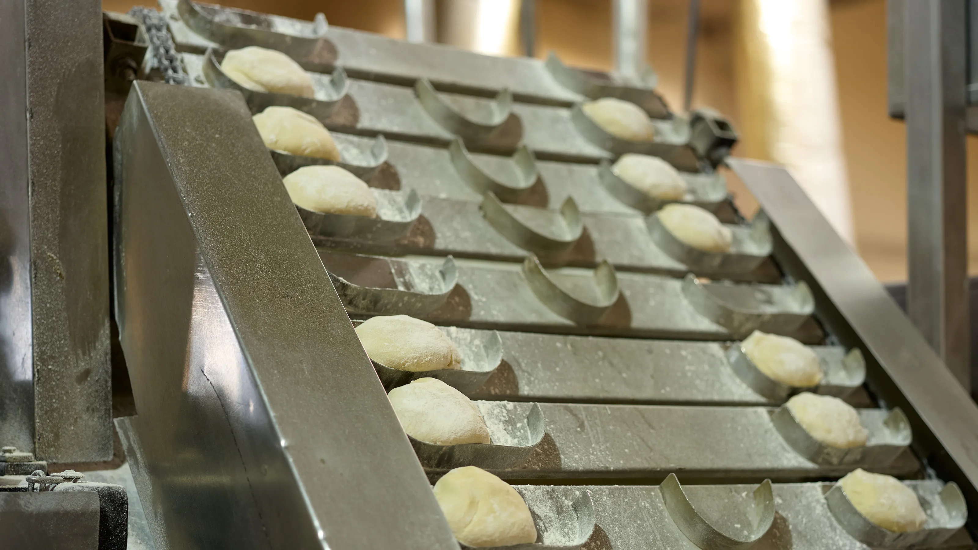 Dough balls on the conveyor